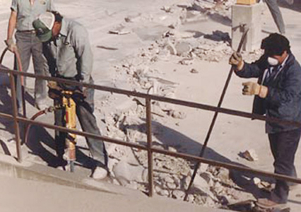 Workers Repairing Floor Workers Repairing Floor